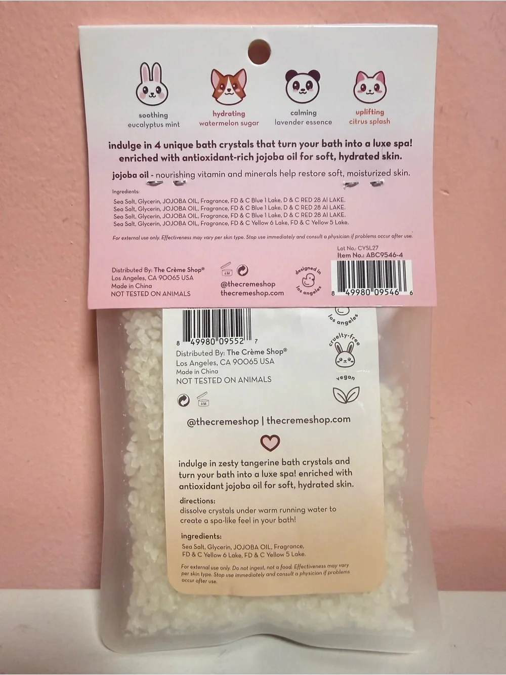 The Crème Shop brand aromatherapy bath crystals in the 